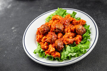 Fototapeta premium Pasta meatballs tomato sauce fresh tasty food dish delicious gourmet food background on the table rustic food top view copy space