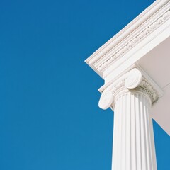 photo of white greek columns on a blue background