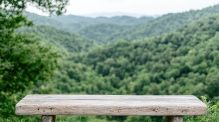 Fototapeta premium Wooden bench overlooking mountain valley; nature background; product display