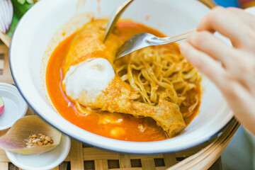 Northern Thai noodle curry soup with chicken