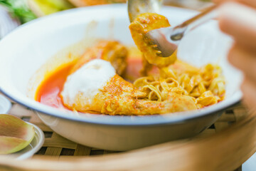Northern Thai noodle curry soup with chicken