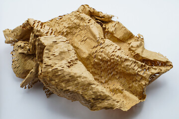 Honeycomb Environmental friendly paper hexagonal shape made of cardboard recycled craft brown paper background lightweight bubble wrapping strength for protective packaging with space white background