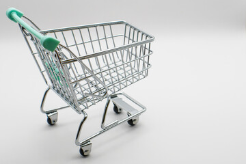 Supermarket shopping cart isolated on white