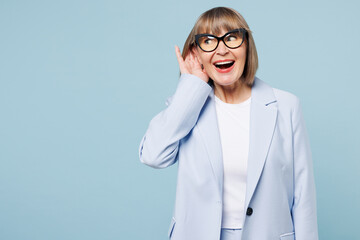 Blonde successful employee business woman 50s wear classic suit glasses formal clothes try to hear...