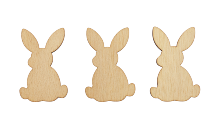 Three identical wooden easter bunny shapes on transparent background