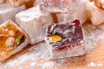 Sweet food Turkish delight, assorted rahat locum in form of cubes with nuts and powdered sugar, traditional food