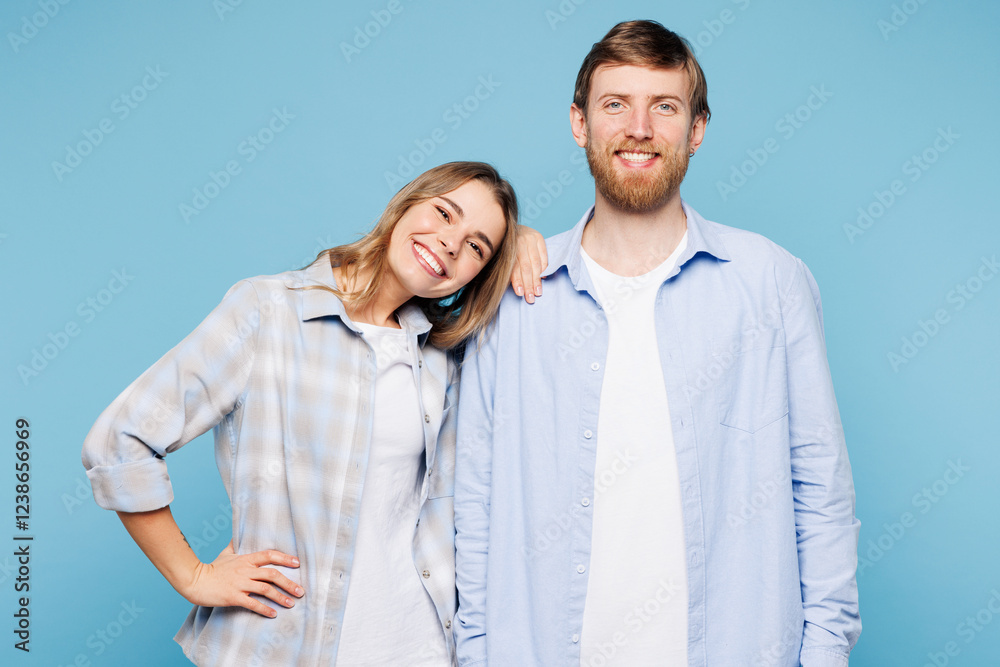 Canvas Prints Young couple two friends family man woman wears shirt casual clothes together put head on shoulder look camera isolated on pastel plain light blue cyan background studio portrait. Lifestyle concept.