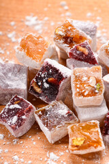 Sweet food Turkish delight, assorted rahat locum in form of cubes with nuts and powdered sugar, traditional food