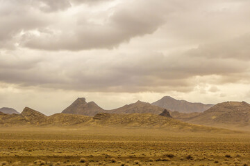 Typical mountain landscape in Isfahan Province, Iran. The visible hills and foothills, almost bare of vegetation, are part of the Central Iranian Range.