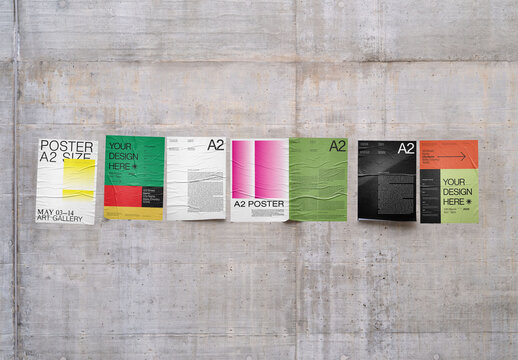 Mockup Of A2 Vertical Customizable Posters On Wall