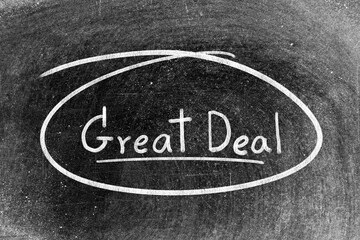 Fototapeta premium White chalk hand writing in word great deal and circle shape on blackboard background