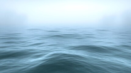 Serene Ocean Waves Under Misty Sky