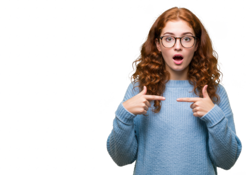 Young woman wearing glasses and a light blue sweater, looking surprised while pointing at herself, isolated on white background - Powered by Adobe