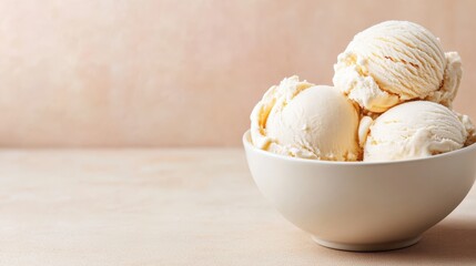 A charming, eye-catching bowl filled with creamy vanilla ice cream spheres, capturing the essence of sweetness and indulgence for those who appreciate delicious desserts.