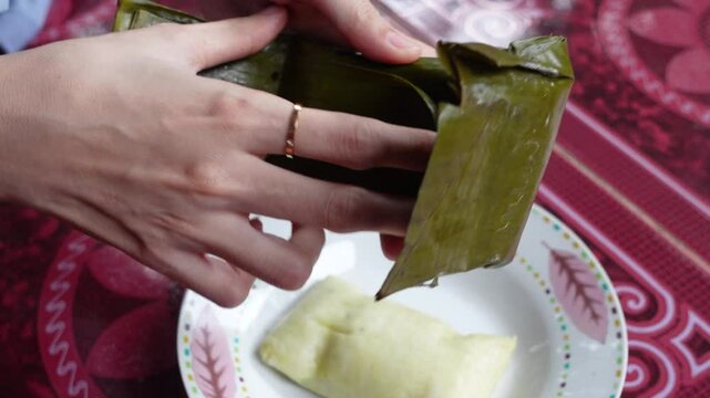 South Kalimantan's special food called lepat or buras is served on a plate.