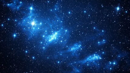 Obraz premium Countless bright stars illuminate the deep blue backdrop of the cosmos, creating a breathtaking view perfect for stargazers. The vastness evokes wonder and exploration