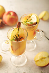Warm apple autumn drink with cinnamon