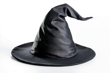 A close-up of a black witch's hat sitting on a plain white surface