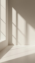 
Soft sunlight casting geometric shadows on a minimalistic beige wall and windowsill, creating a warm and tranquil atmosphere