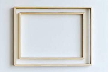 Fototapeta premium Double Wooden Frame on White Wall: A Minimalist Composition