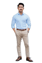 Fototapeta premium A well-dressed man stands confidently in a light blue shirt and beige chinos, perfect for showcasing menswear fashion or business attire. Use this image for your website or social media.