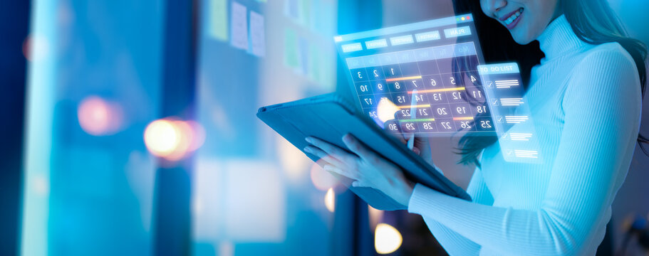 2025 Event planner timetable agenda plan,schedule event.Businesswomen use pen marks on the virtual screen calendar,workflow plan,strategy,work planning,Organize schedules,checklist and important dates