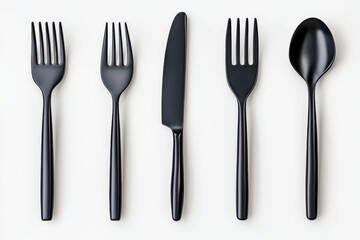Collection of professional grade kitchen cutlery and dining utensils featuring a sleek minimalist design in a sophisticated black color scheme  These cooking tools are perfect for use in restaurants
