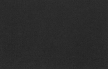 The texture of the canvas fabric is dark grey color. Horizontal abstract blank background for design ideas. Rustic linen.