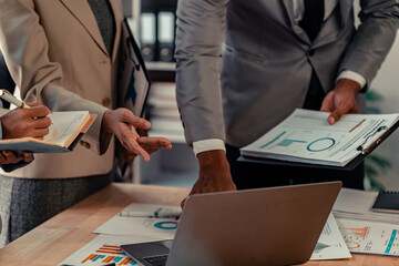 Businessman's hands and documents for a meeting budget planning and network strategy, business people, financial and technology documents at the table for creative research analysis