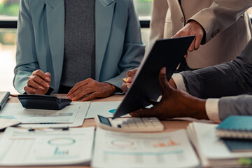 Businessman's hands and documents for a meeting budget planning and network strategy, business people, financial and technology documents at the table for creative research analysis