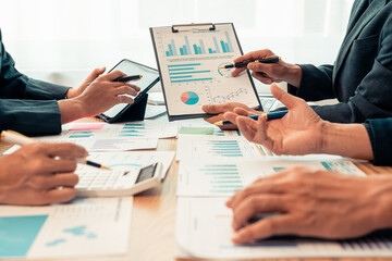 Businessman's hands and documents for a meeting budget planning and network strategy, business people, financial and technology documents at the table for creative research analysis