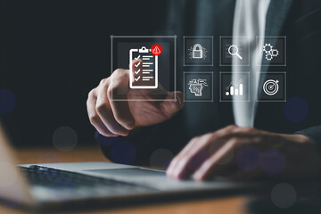 close up with hand of business person identify danger risk with AI among normal incident. Risk...