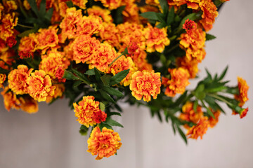 Floral background with artificial flowers close-up.