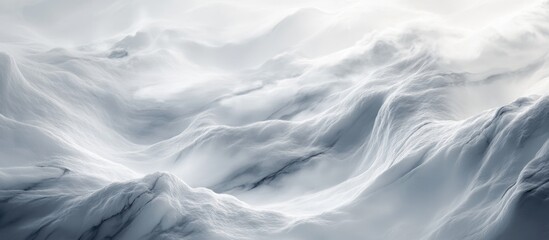 Fototapeta premium Abstract snow-covered mountain peaks with fog and mist atmosphere