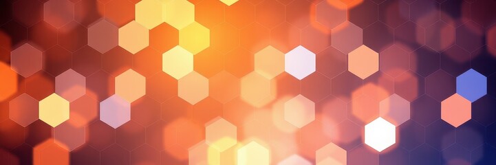 A close-up of hexagonal lights, blurred to create a pattern of orange, yellow, and white hues