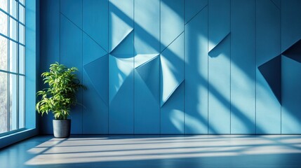 Obraz premium Sunlit room with blue geometric wall, plant, and large window.