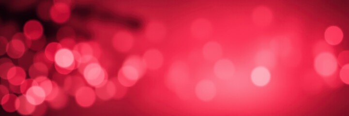 Red lights create a blurry, sparkling effect in the dark