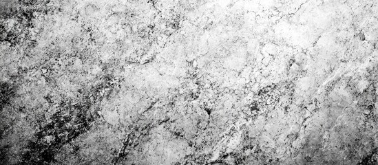 Textured marble stone surface with various shades of gray and white, suitable for background or design use, copy space available.