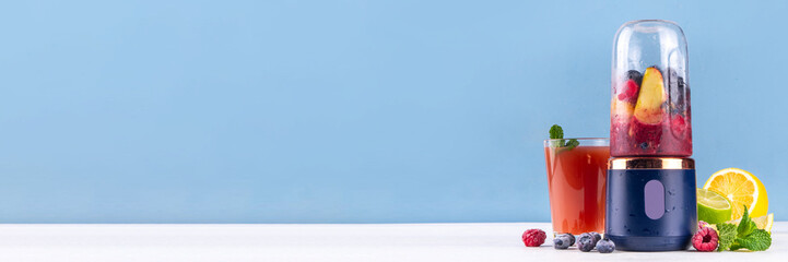 Healthy fruit and berry smoothie drink in portable portioned blender, Juicer Cup for smoothie,...