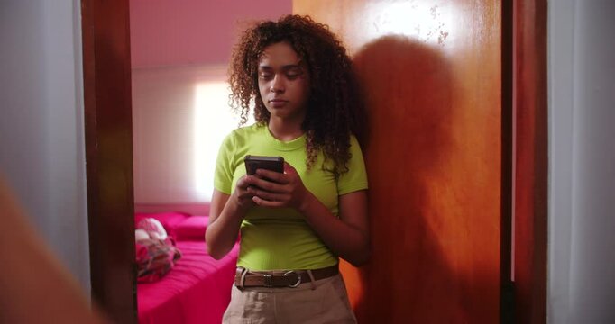 Teenage daughter disrespectfully takes cellphone back from mother, escalating conflict as she closes door on mother&rsquo;s face, family struggles over technology boundaries