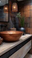 A beautifully designed bathroom showcases a striking copper sink atop a sleek countertop. Warm pendant lights illuminate the earthy decor, creating a serene atmosphere enriched by natural elements