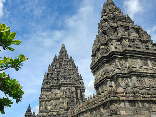 Ancient Stone Prambanan Temples, Yogyakarta. Stand Tall Against a Bright Blue Sky, Majestic...