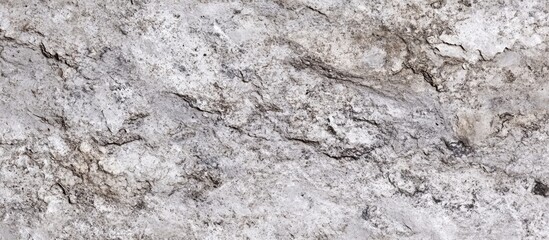 Naklejka premium Granite stone texture with natural cracks and variations in gray and brown tones