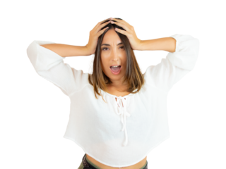 Frustrated young brunette woman with hands on head isolated over transparent background. PNG transparent.