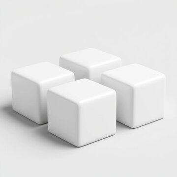 Fototapeta Four white cubes arranged on a white background.