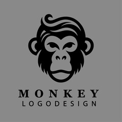 Minimalist black and white monkey face logo design vector illustration perfect for branding esports mascots wildlife nature and business identity concepts