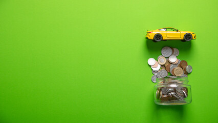 Car with a stack of coins. Save money for car