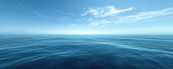 Deep blue ocean stretching to the horizon with a calm, serene sky above