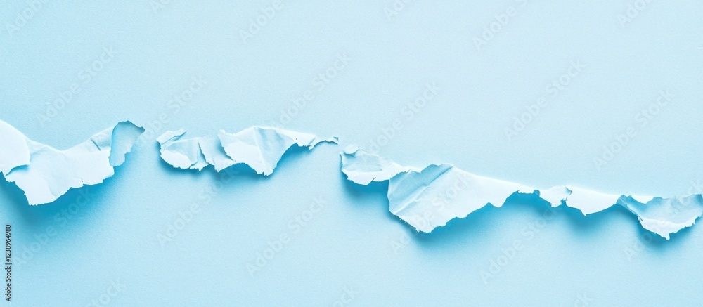 Aufkleber Torn blue paper texture on light blue background with space for text or design elements in horizontal orientation