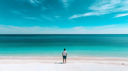 Solitary Figure on Tranquil Beach,Gazing at Boundless Ocean Horizon